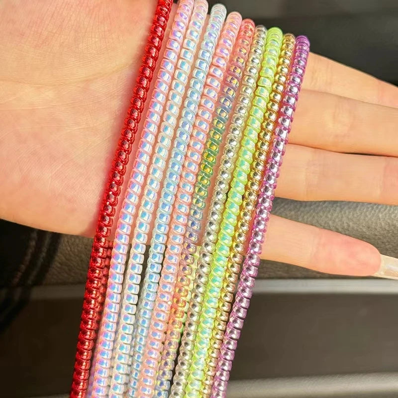 Colorful Spiral Cable Protector for All Devices.”