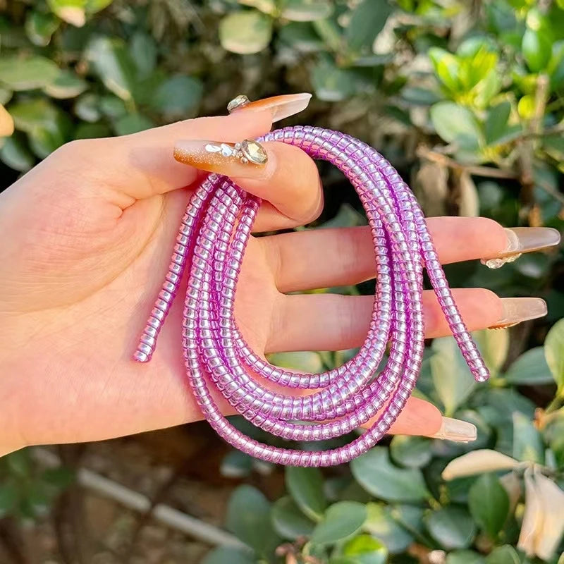 Colorful Spiral Cable Protector for All Devices.”