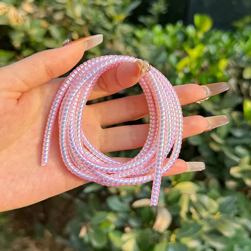 Colorful Spiral Cable Protector for All Devices.”