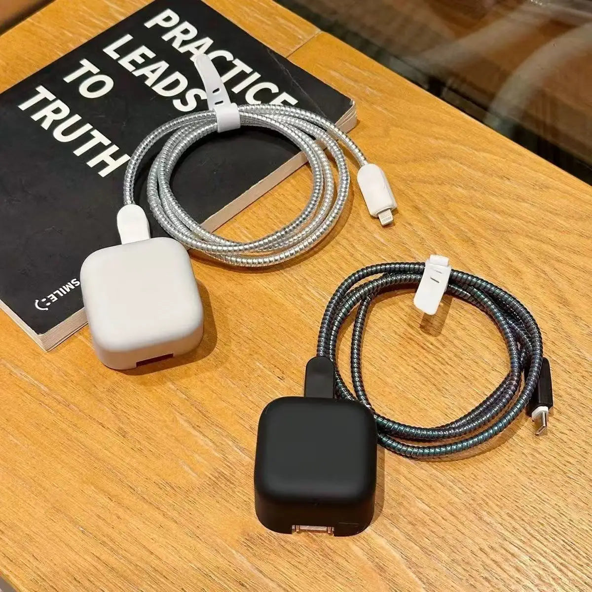 Frosted protective case for charger and cable.”